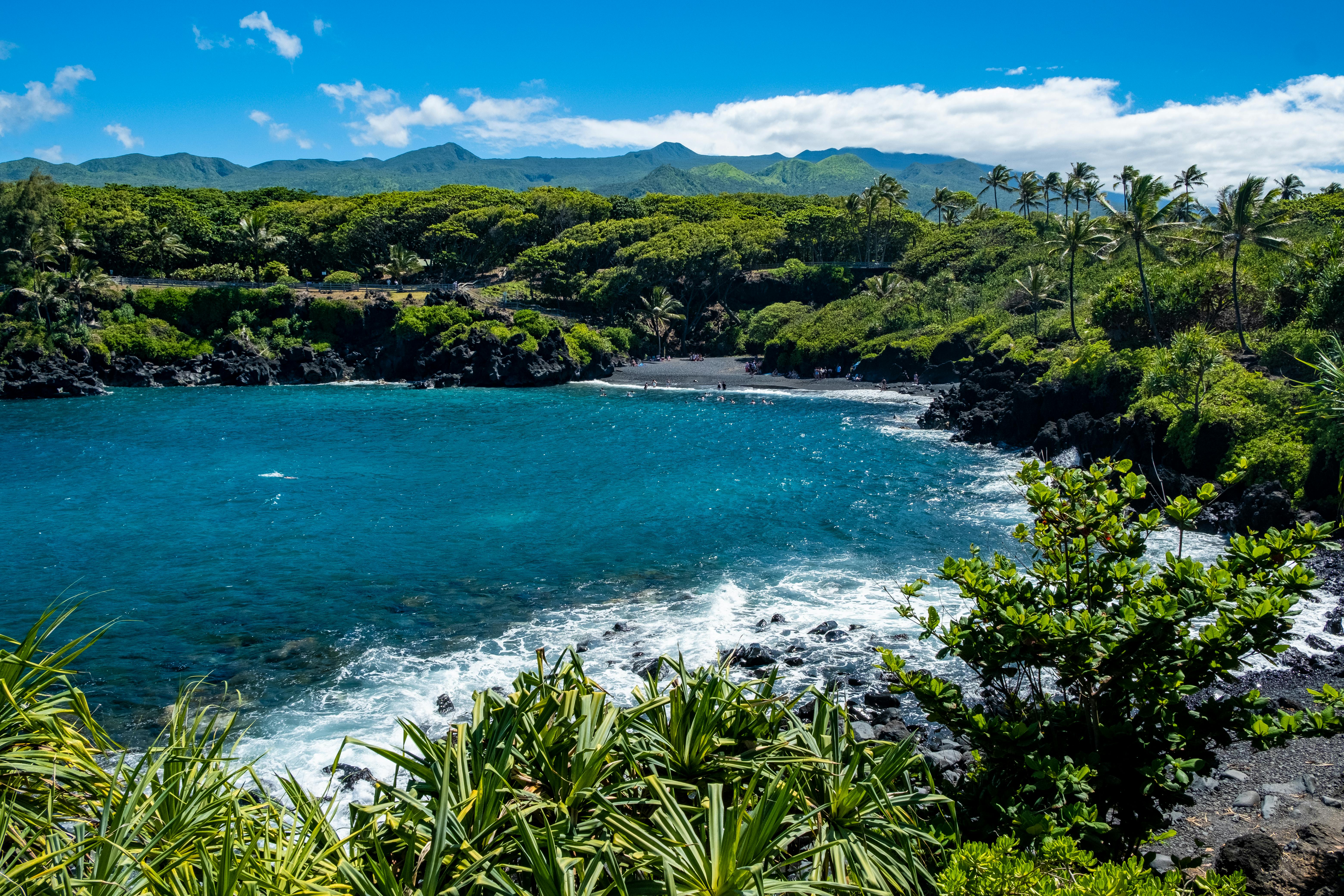Maui and black sand beach in hana